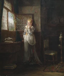 Ein junges Mädchen in Erwartung am Fenster